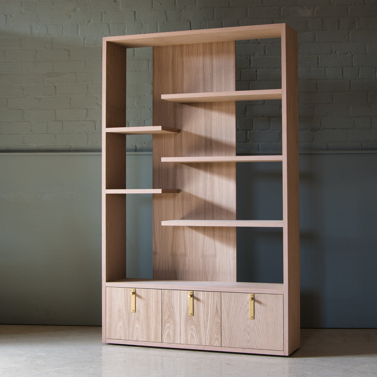 Oak shelving unit with cupboards and brass handles, Vlad – handmade by KODA Studios