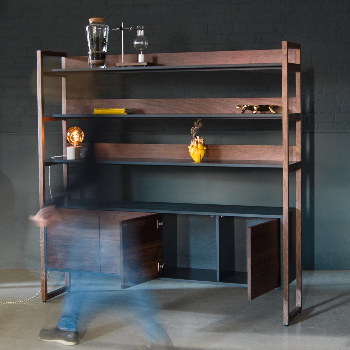 An image of the Walnut Shelving Unit, Ari product available from Koda Studios
