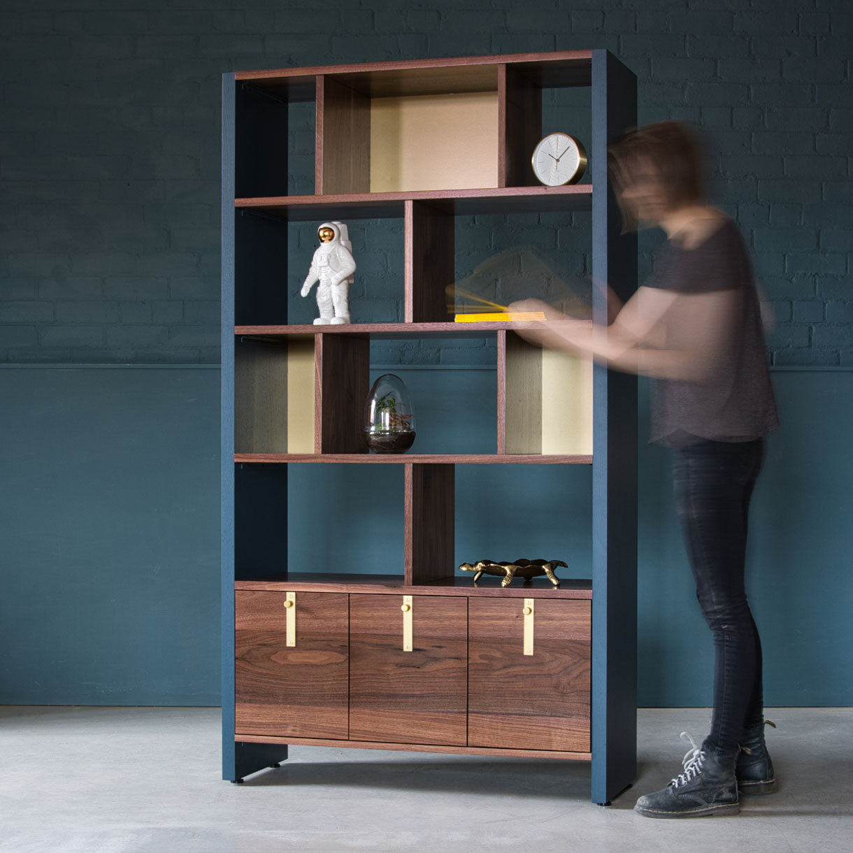 An image of the Walnut Bookcase, Aeris product available from Koda Studios