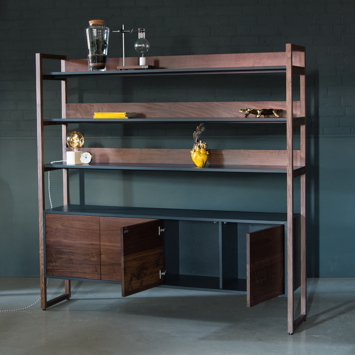 An image of the Walnut Shelving Unit, Ari product available from Koda Studios