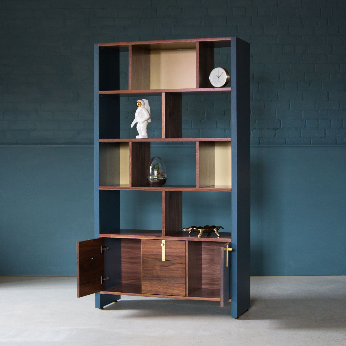 An image of the Walnut Bookcase, Aeris product available from Koda Studios