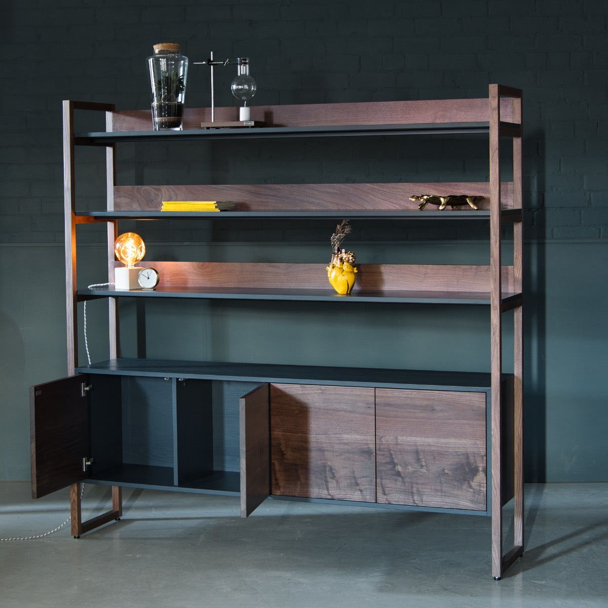 An image of the Walnut Shelving Unit, Ari product available from Koda Studios