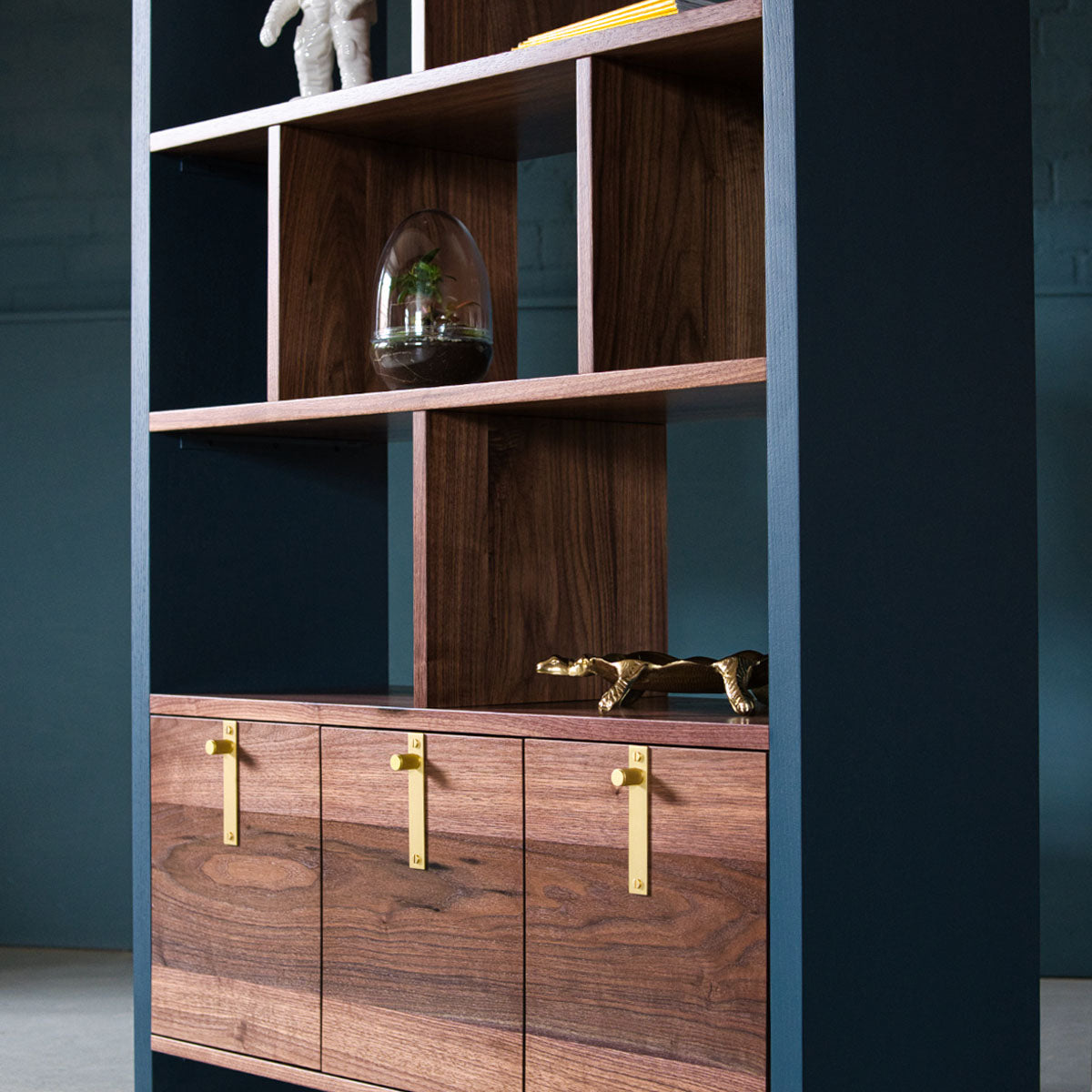An image of the Walnut Bookcase, Aeris product available from Koda Studios
