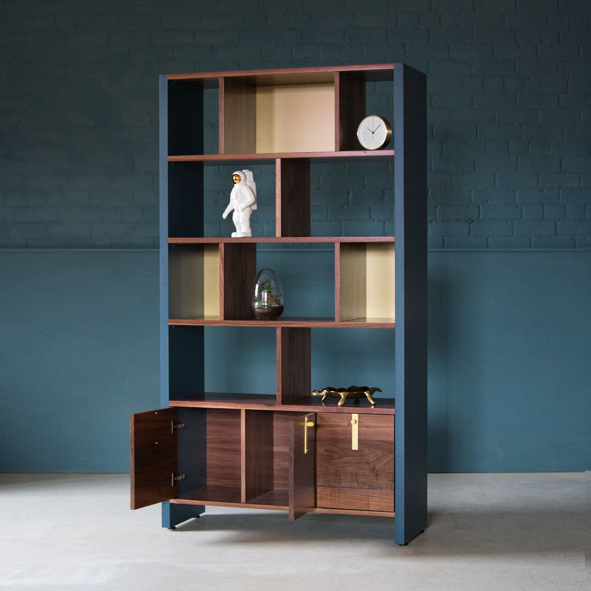 An image of the Walnut Bookcase, Aeris product available from Koda Studios